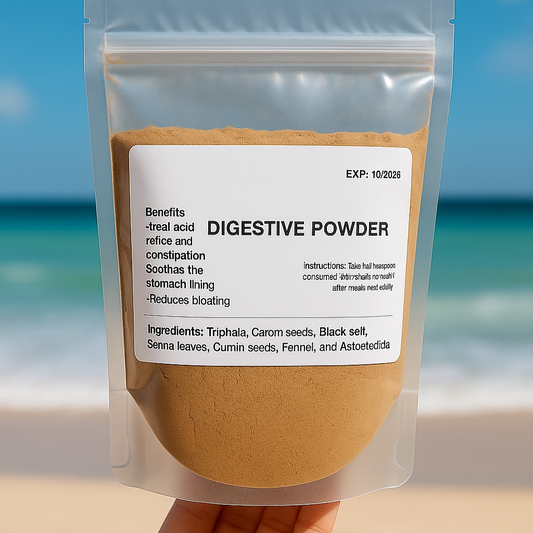Package of digestive powder held in front of a beach